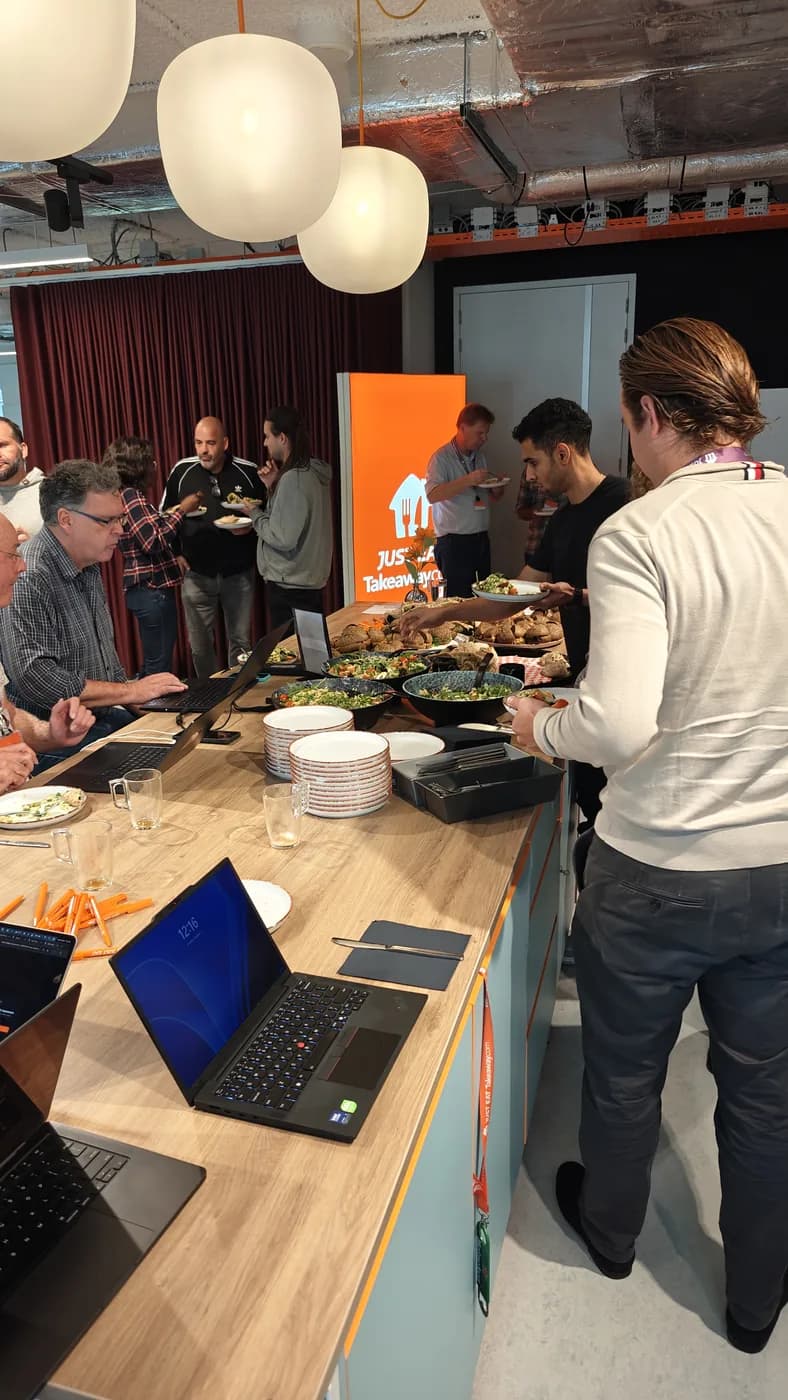 Lunch at the counter, laptops still open